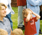 Little girl at flag raising
